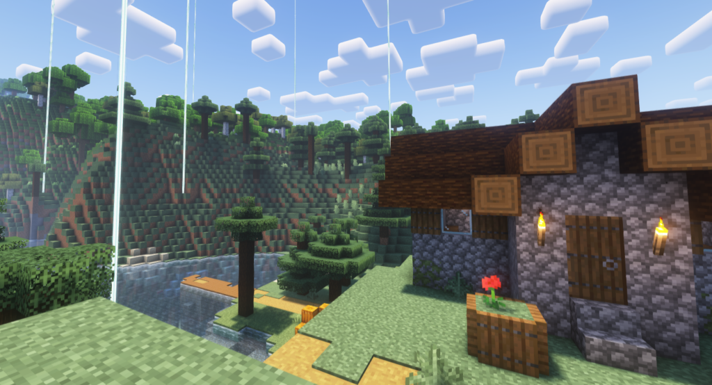 A cozy Minecraft village house with wooden accents and stone walls, surrounded by lush trees, a river, and beacon beams illuminating the forested landscape in the background.