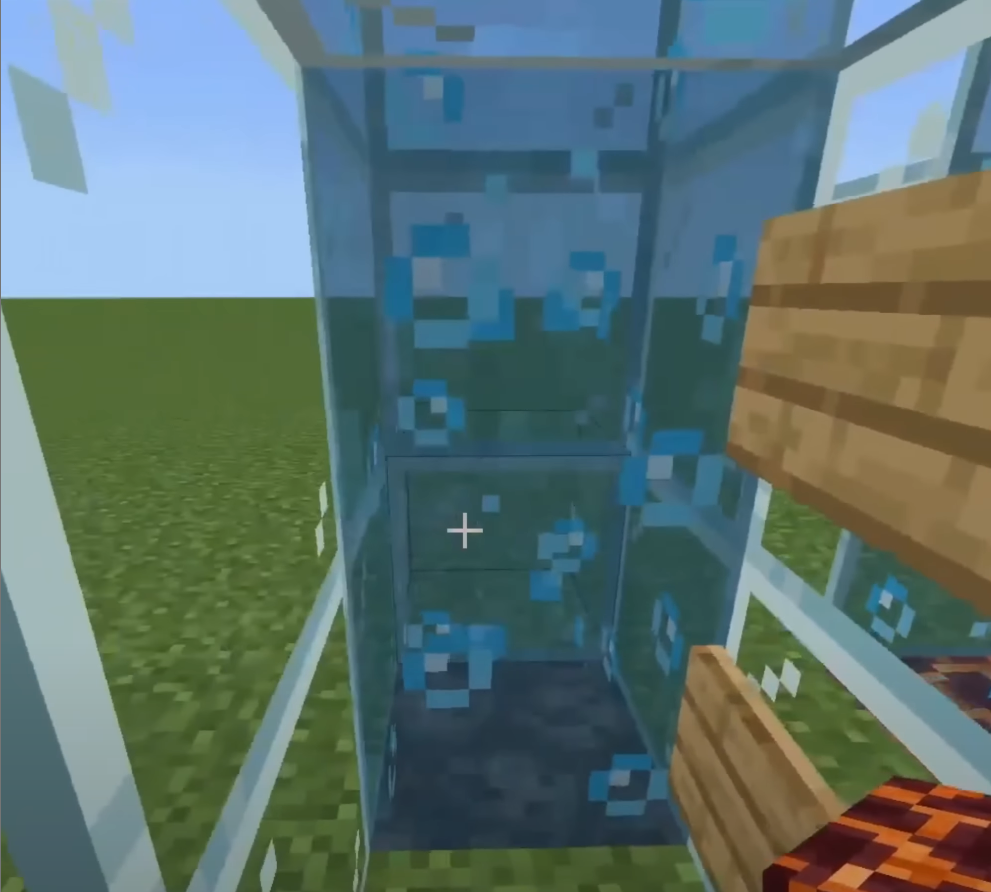 Minecraft water elevator using soul sand for fast vertical movement.