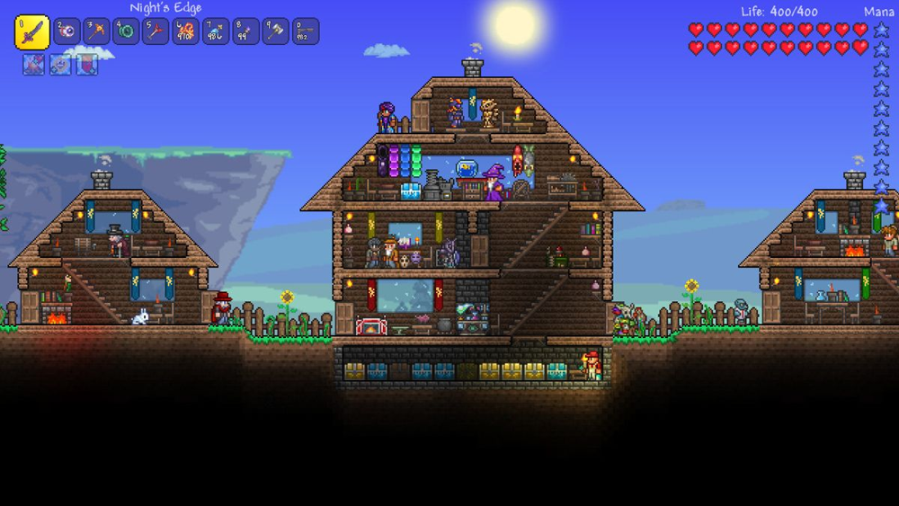 Terraria encourages us to unleash our creativity. Here we've built a cozy multi-house base for our NPCs, filled with trophies and gear. Crafting and building together in multiplayer turns our world into a personalized home.